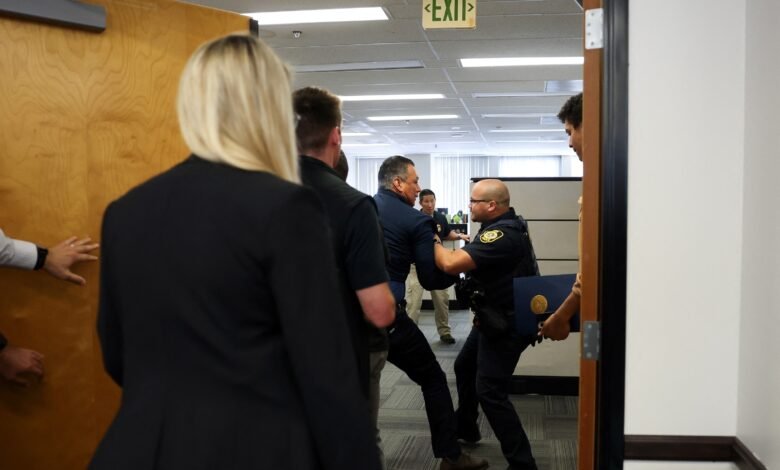 Democrats condemn the senator pushed down and handcuffed at Noem's press conference