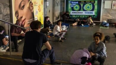 Photo: People take refuge in a subway station during a Russian drone attack in Kyiv
