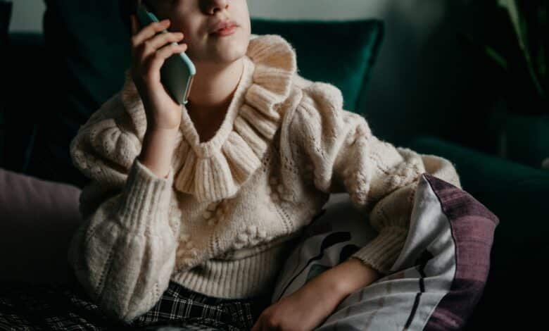 Photo: A teenager speaks on a phone in a file photo without date.