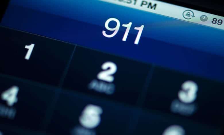 Photo: 911 is shown on the screen of a smartphone in a file photo without date.