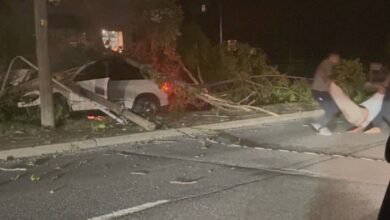 Army player Larry Picytt Jr. and Dad get the man out of the car just before he explodes in flames