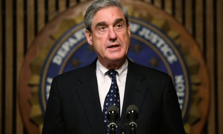 Photo: The director of the FBI, Robert Muller, celebrates the press conference
