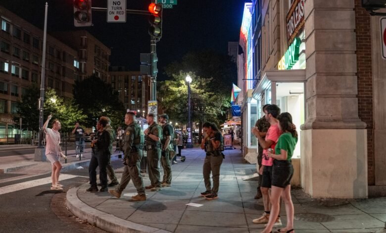PHOTO: FBI and Border Patrol officers speak with Sean Charles Dunn, August 10, 2025, in Washington, DC