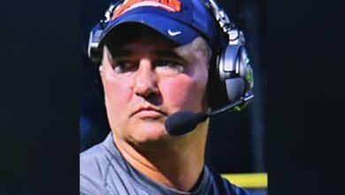 Missing Virginia football coach wanted on child sex abuse charges walked into woods with gun, family says