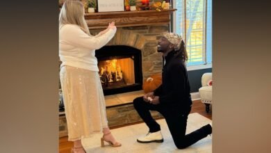 The family celebrates the second Thanksgiving dinner with the mailman who came to the father's aid