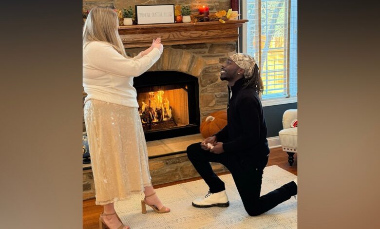 The family celebrates the second Thanksgiving dinner with the mailman who came to the father's aid