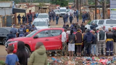 A manhunt begins in South Africa after a group of robbers shot dead nine people in a tavern