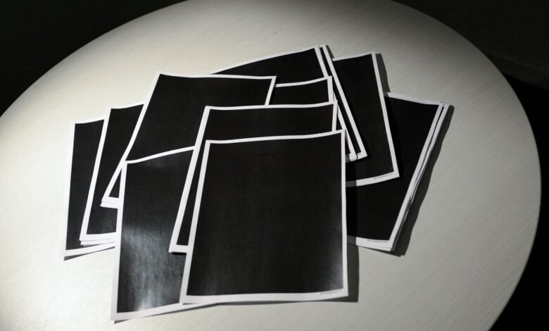 PHOTO: Newly released documents from the late financier and sex offender Jeffrey Epstein, including a sheaf of completely redacted pages, are seen in a Reuters photograph in Washington, DC, December 19, 2025.