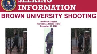 PHOTO: An image shown at a news conference shows a person described as an unknown suspect in the Brown University shooting, as the search for the shooter continues, in Providence, Rhode Island, on December 15, 2025.